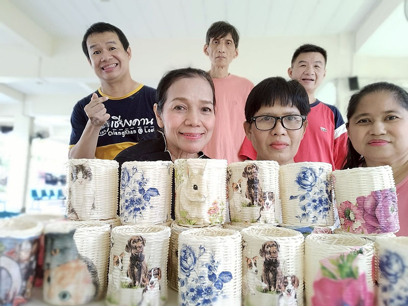 Members of the Dao Ruang Group gather for a group photo after a successful fundraising event on the half day activity.