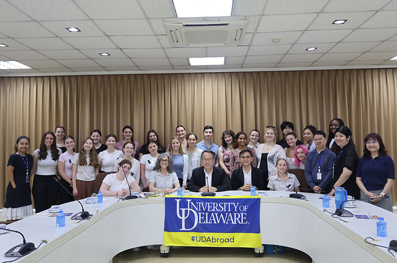 Group photo of students, professors and APCD executive director and staff.