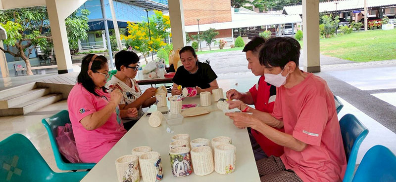 The members showcase their creativity by making and painting handicrafts during the fundraising event.