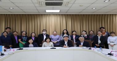 A group photo showing the project's working group along with the project advisory board members, comprising representatives from various organizations.