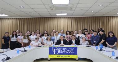 Group photo of students, professors and APCD executive director and staff.